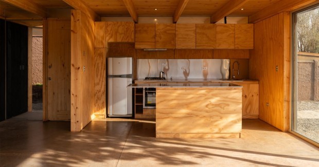 Los Pinos House Details a Unique Structure Highlighting the Use of Prefabricated Pine Partitions and Plywood Coverings Setting New Standards for Contemporary Architectural