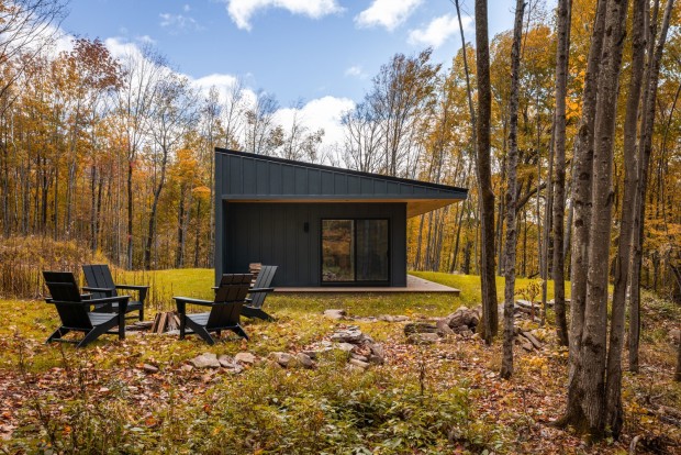 Livingston Manor House Design Features a Triangulated Cantilevered Roofline, Adding Visual Elegance to Indoor and Outdoor Spaces