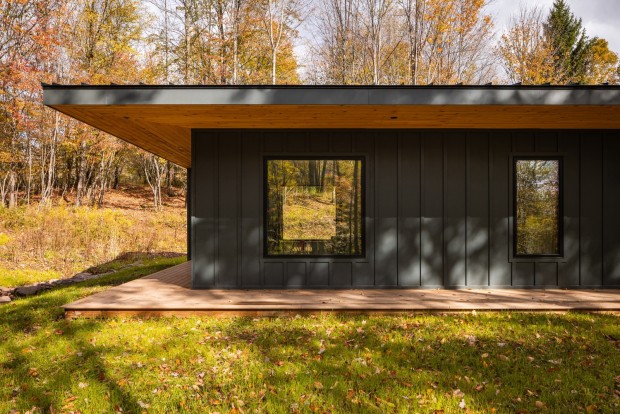 Livingston Manor House Design Features a Triangulated Cantilevered Roofline, Adding Visual Elegance to Indoor and Outdoor Spaces