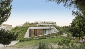 Arena House by ZIM Arquitextura Embraces the Natural Landscape with Grass-Topped Design
