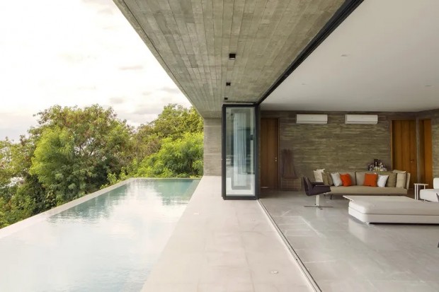 Concrete House by Micaela Benedicto Stands Tall on the Cliffs by the Ocean of Batangas