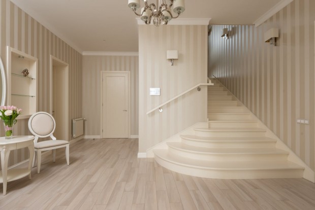 Interior of modern apartment with beige walls