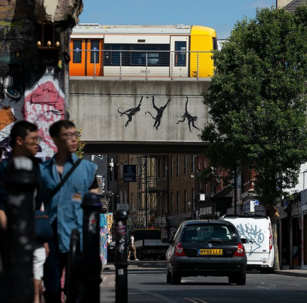 Three Monkeys Swinging Over Brick Lane is Banksy's Third Artwork in London